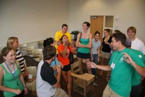 Small group of persons debating