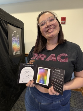 Madison McBride holding an aura photo
