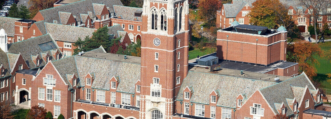 Aerial photo of Administration Building with part of the Boler College of Business building and O'Malley building showing with Rodman Hall in the background