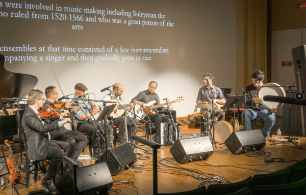 Journey West musicians performing on stage
