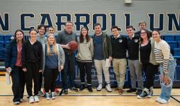 WJCU Radio Station team at Senior Night for JCU men's basketball 