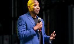 George Sample giving a speech. 