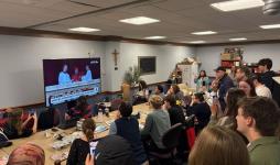Members of the John Carroll University community gather to celebrate the selection of the new pope
