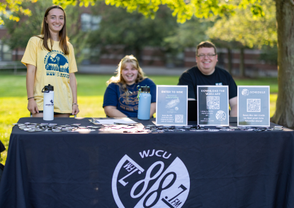 wjcu students smiling at the camera