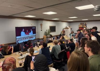 Members of the John Carroll University community gather to celebrate the selection of the new pope