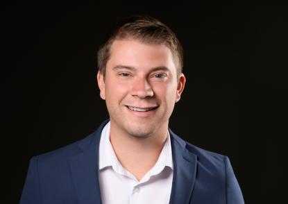 Headshot of Alex Guthrie, Director of Events at TopNotch Management